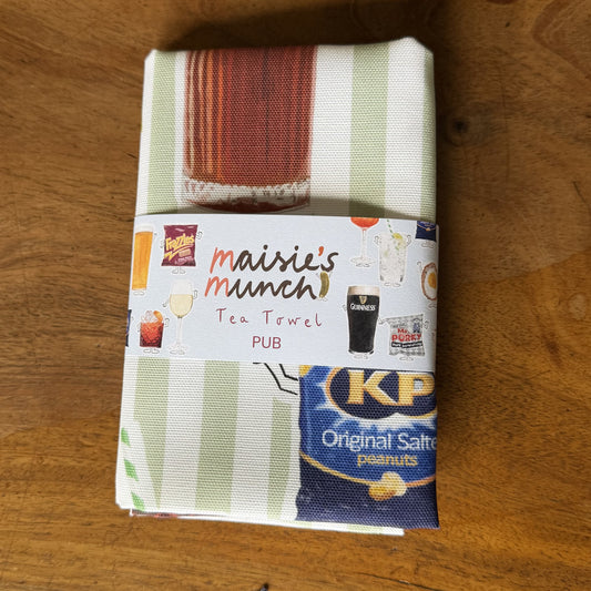 English Pub tea towel folded in its Maisie's Munch paper band