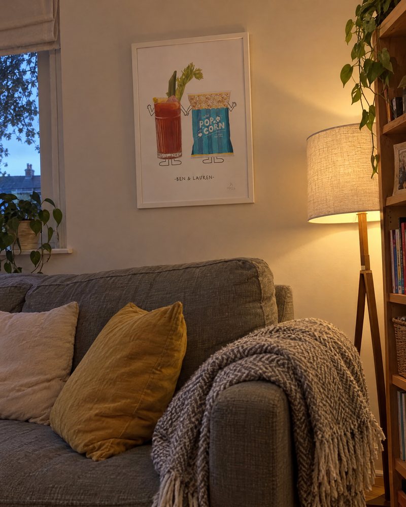 Framed Munch for Two print above a sofa
